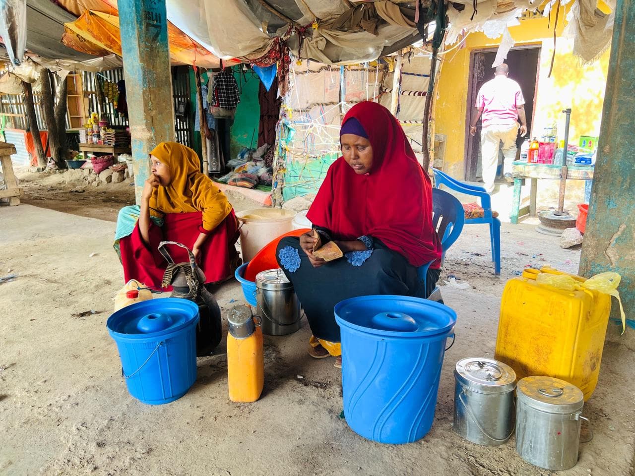 Woman running a small market business